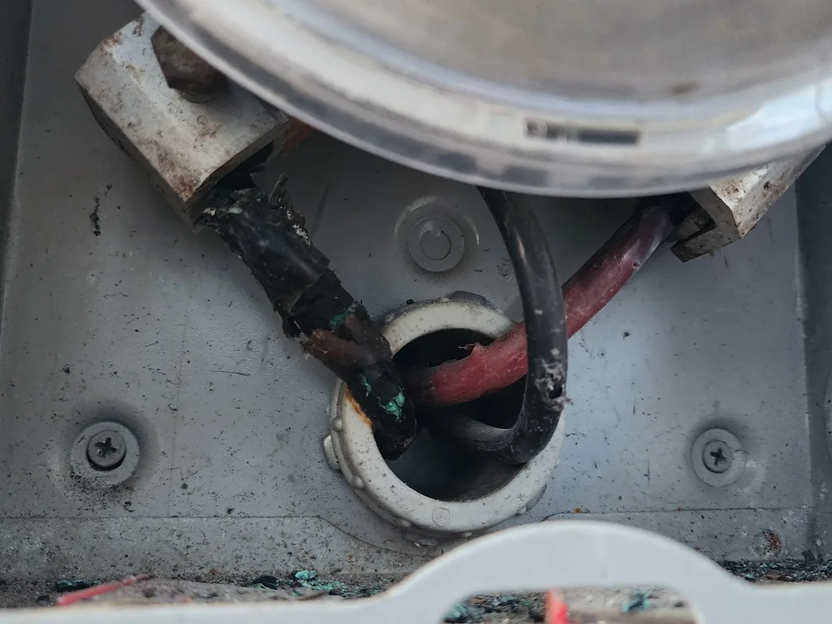 Damaged electrical wiring at a meter connection