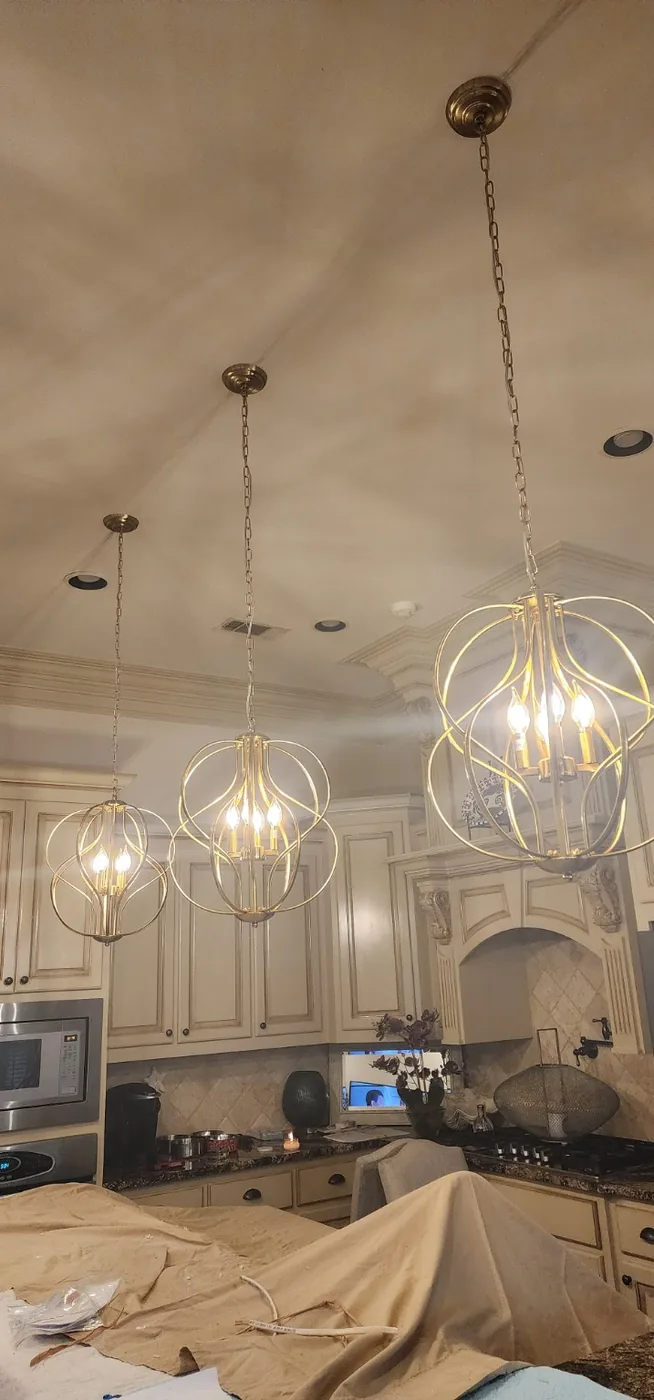 Decorative pendant lighting installed in a residential kitchen